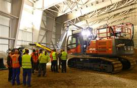 A team of remediation and exquipment experts with the machine at the Dethlinger Pond site