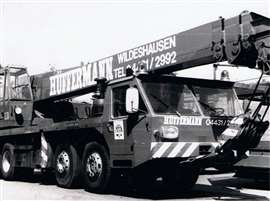 black and white photo of one of the first Liebherr wheeled mobile cranes in the Hüffermann fleet