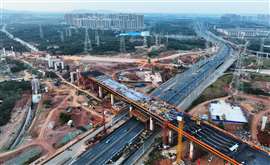 Construction workers are working in China's Nanchang-Jiujiang High-speed Railway Ganjiang River Highway and Railway Bridge, the China's first 350km/h mixed-layer bridge, in Nanchang, Jiangsu province, China, Oct 10, 2024. (Photo by CFOTO/Sipa USA)