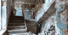 Inside a delapidated building with asbestos